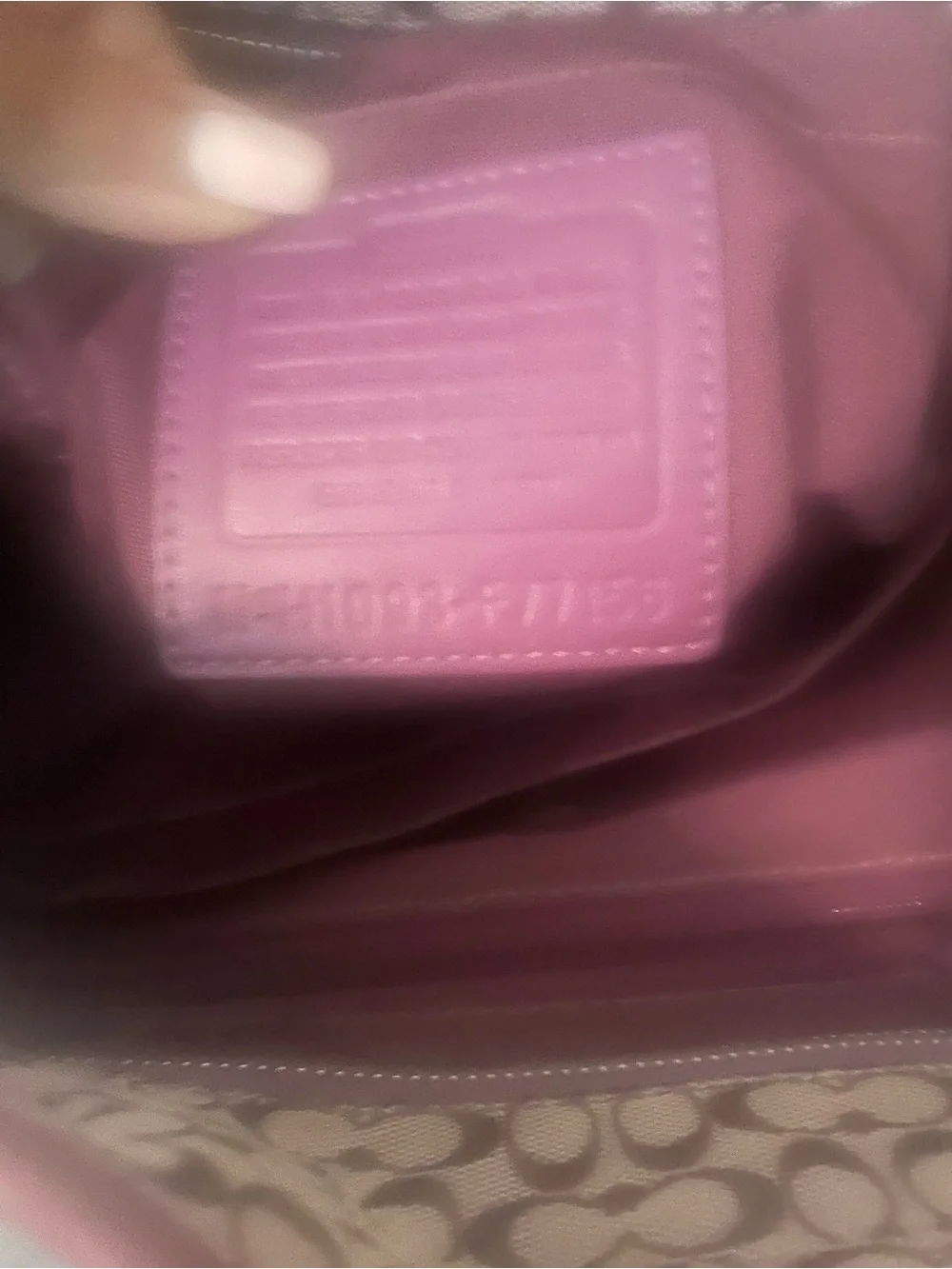 Coach tote featuring